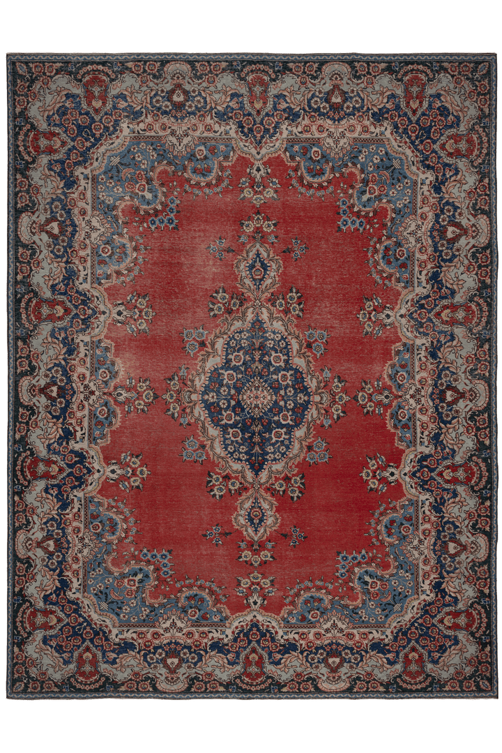 Oversized red and navy Persian-style wool and cotton area rug featuring intricate floral patterns and traditional motifs.