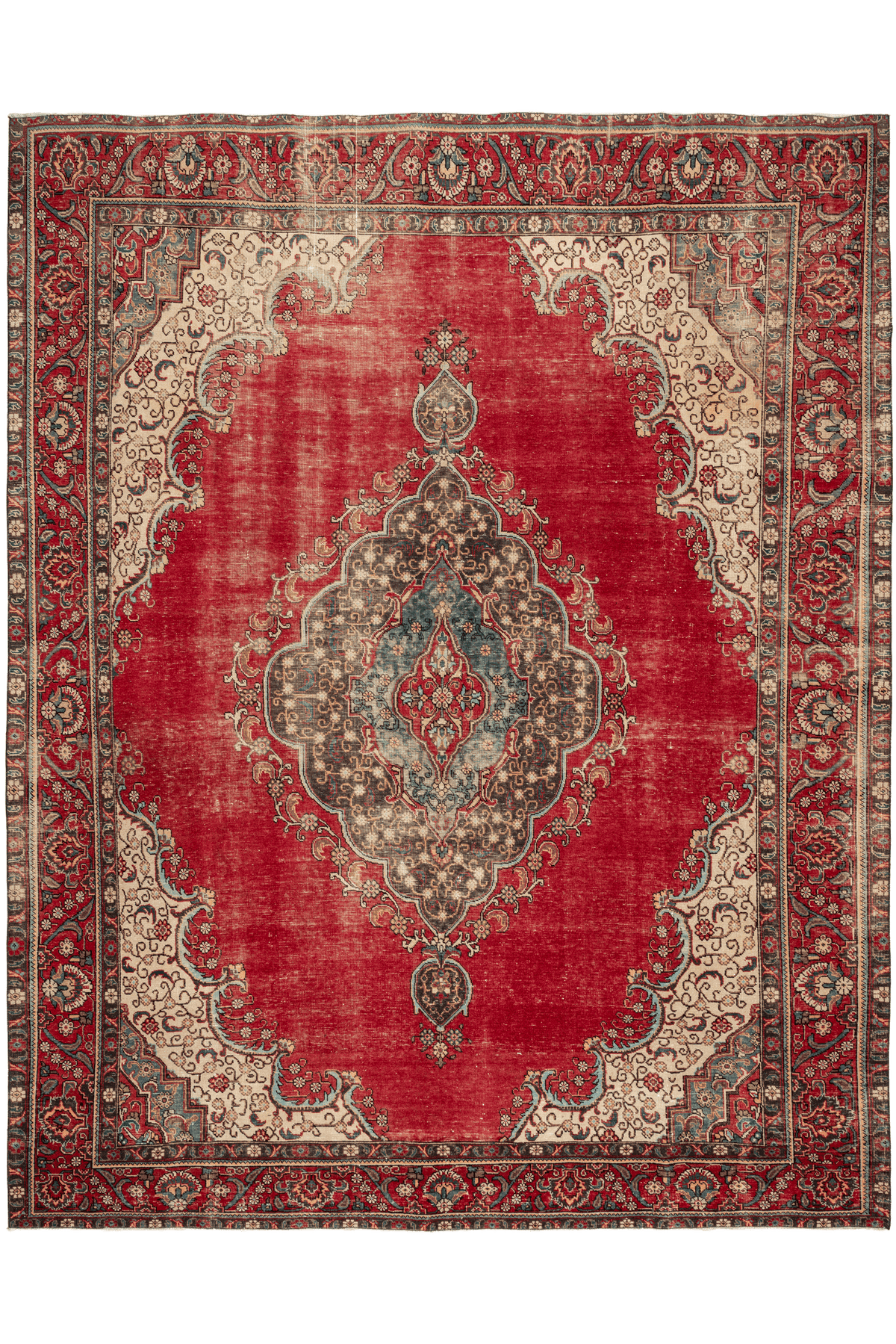Oversized 9x11ft handmade wool and cotton Persian rug featuring a red floral pattern with traditional bohemian motifs.