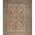 Oversized 10x13 Persian-style wool and cotton rug featuring intricate brown and green floral patterns on a warm base.