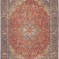 Oversized red Persian-style area rug in wool and cotton with intricate floral motifs and traditional bohemian patterns.