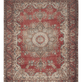Oversized 9x12 Persian-style wool and cotton area rug featuring a red floral medallion pattern in a traditional bohemian design.