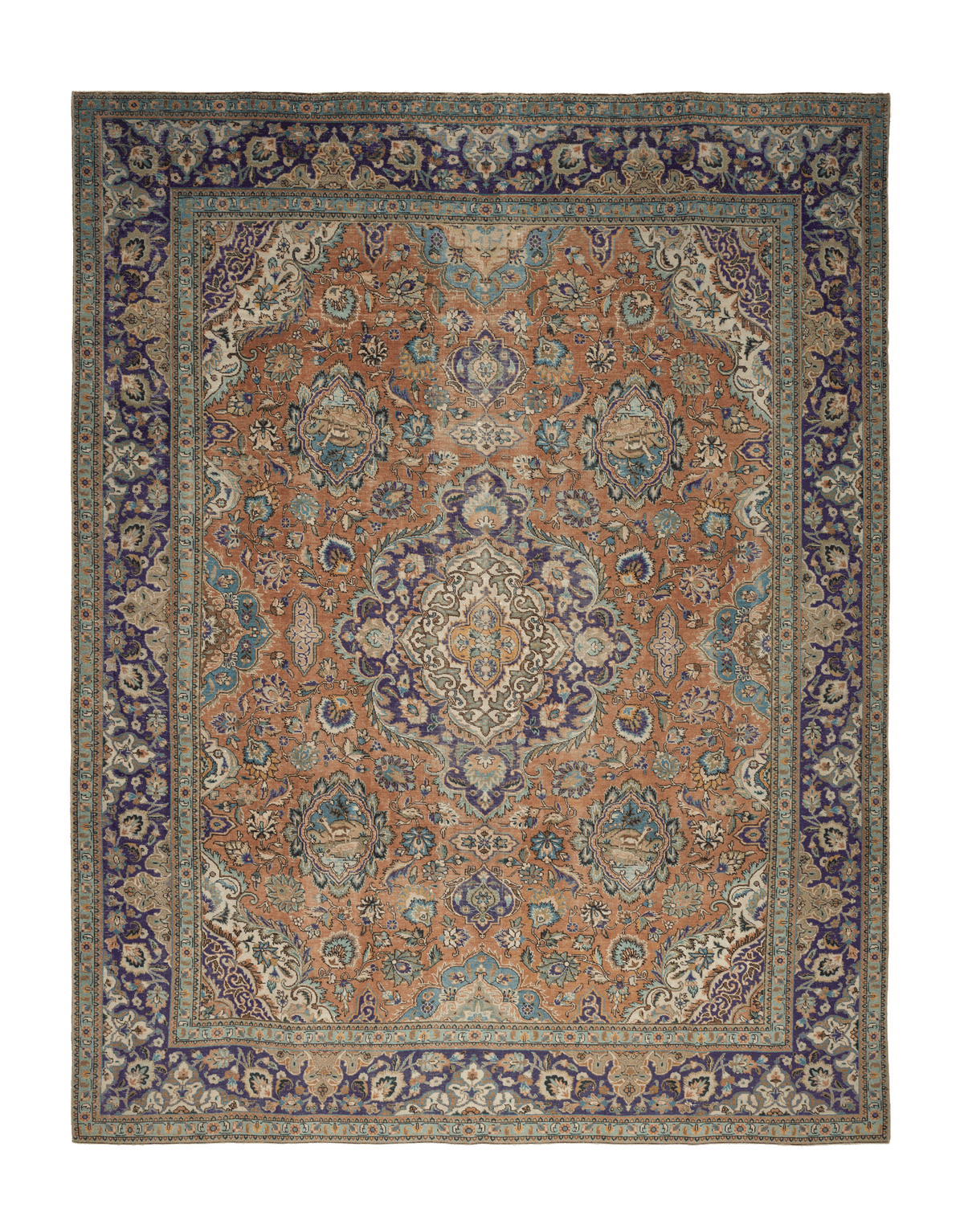 Oversized Persian-style wool and cotton rug in orange and navy with intricate floral patterns and traditional motifs.