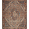 Oversized 9.7x12.5 ft Persian-style wool and cotton rug with brown floral motifs and intricate traditional patterns.