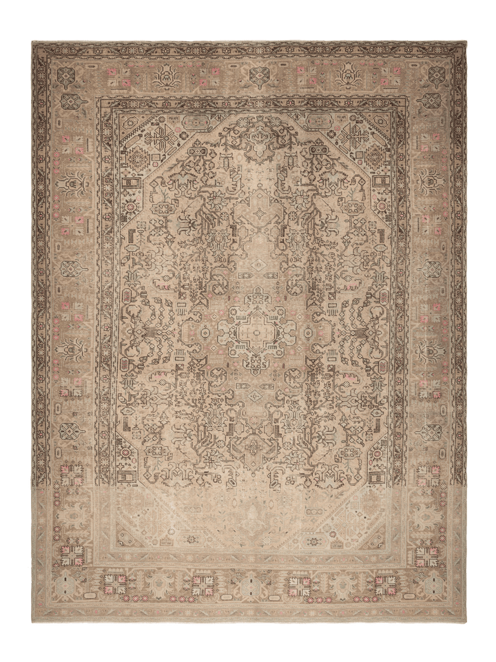 A traditional oriental-style area rug with an intricate floral and geometric pattern in muted beige, brown, and dusty pink tones, shown flat against a white background.