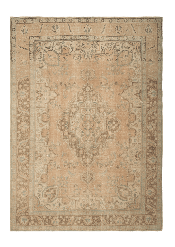 Oversized 8x11 Persian-style wool and cotton rug in beige and brown with traditional floral motifs and a low pile.