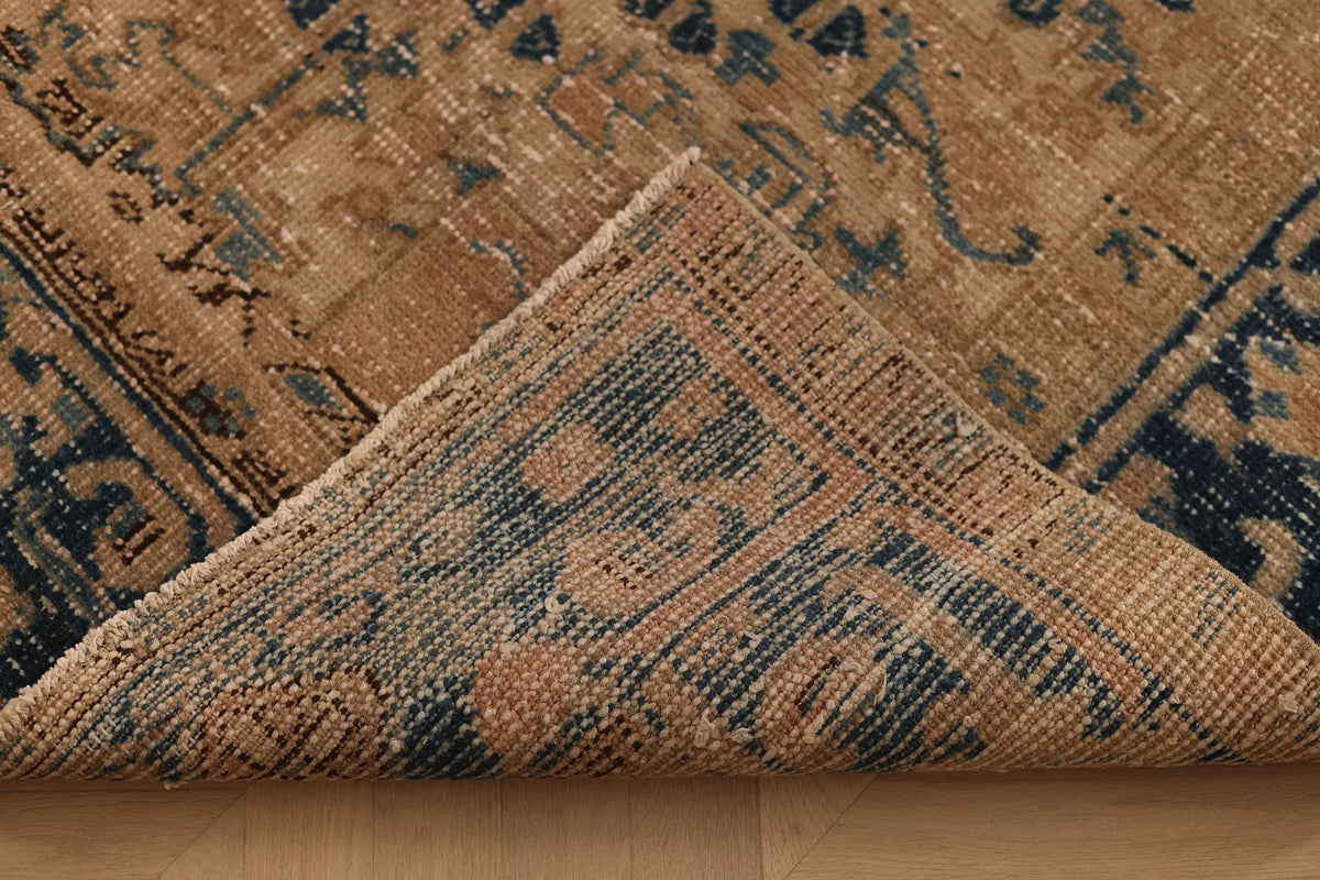 Vintage Isparta Turkish Area Rug 7x9 ft — Brown & Blue Geometric