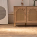 Hand-woven vintage Turkish runner rug in beige and brown wool and cotton with geometric patterns on a wooden floor.