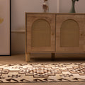 Handmade white and brown wool-cotton Persian-style kilim runner with geometric patterns in a farmhouse interior.