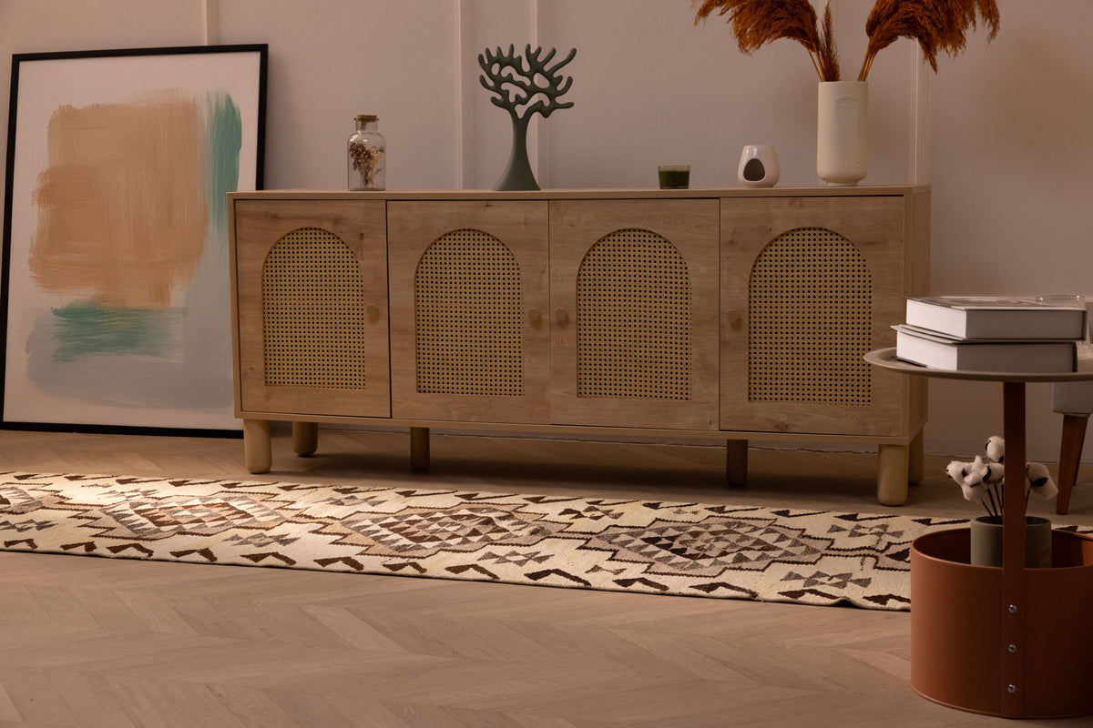 Handmade white and brown wool-cotton Kilim runner rug with geometric patterns in a farmhouse living room.