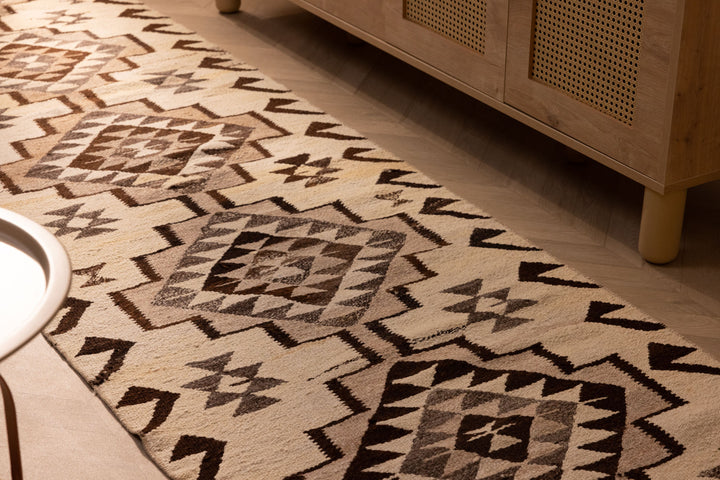 Handmade 2.9x11.2 ft Persian-style wool and cotton runner rug featuring white and brown geometric patterns.