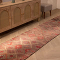 Handmade 2.7x13.2 ft brown wool and cotton Persian-style runner rug with geometric Bohemian patterns.