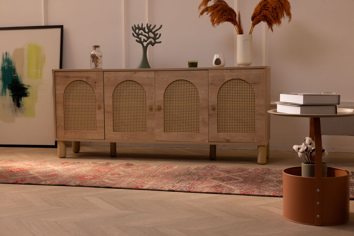 Brown Persian-style runner rug with geometric patterns, handmade from wool and cotton, 2.7 x 13.2 ft, in a bohemian living room.