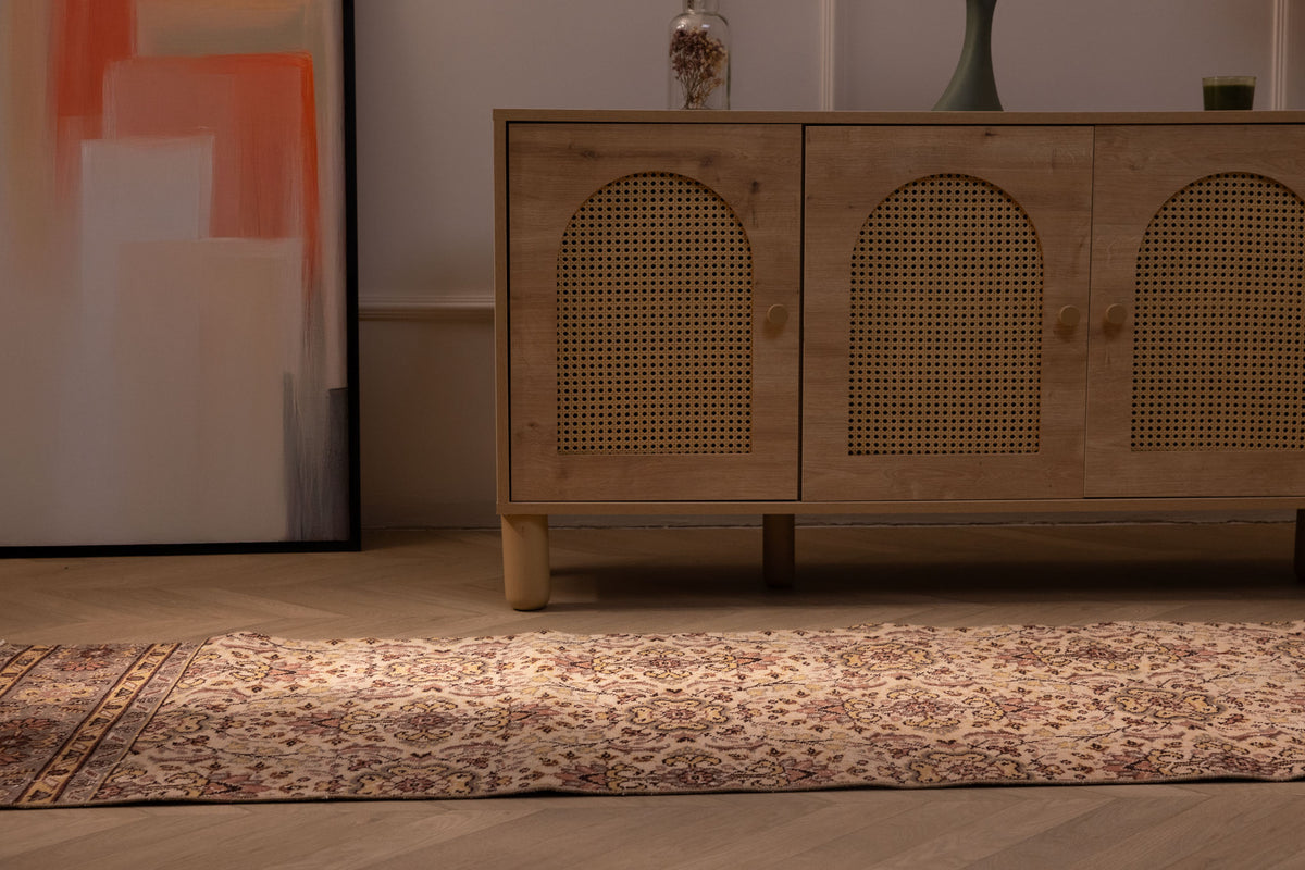 Vintage Isparta wool and cotton runner rug with white and beige floral patterns in a farmhouse hallway setting.