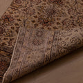 Hand-woven vintage Isparta wool and cotton runner rug in white and beige with intricate floral maximalist patterns.