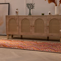 Handmade 3x11 ft wool and cotton Persian-style kilim runner with pink and orange geometric patterns on a wooden floor.