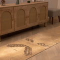 Vintage 2x11 ft beige and brown geometric Turkish wool runner rug in a farmhouse hallway.