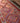 Bohemian 3x11 ft wool and cotton flatweave runner rug featuring orange and pink geometric patterns.
