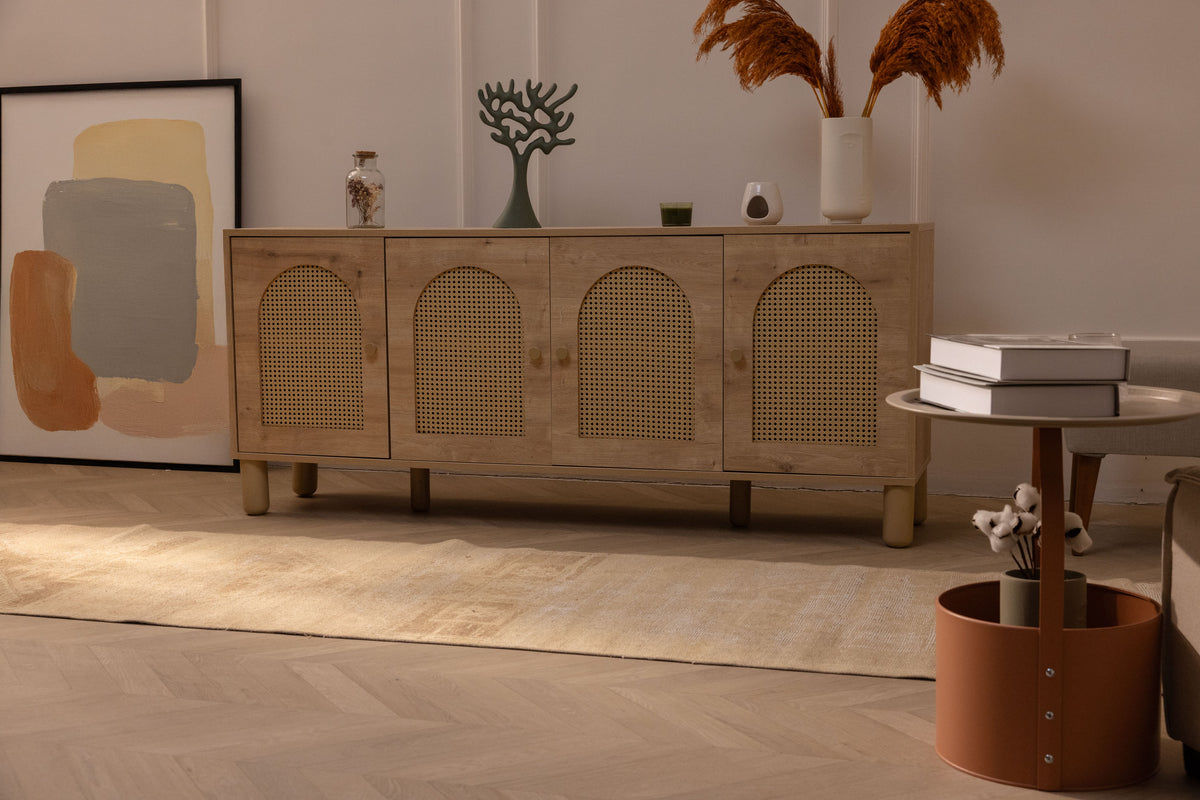 Vintage 2x10 ft beige and brown geometric Turkish runner rug in a farmhouse living room.