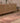 Bohemian 2.7x9.5 ft runner rug in pink and brown wool-cotton blend with geometric Persian-style patterns.