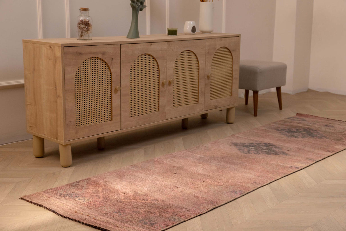 Bohemian 2.7x9.5 ft runner rug in pink and brown wool-cotton blend with geometric Persian-style patterns.