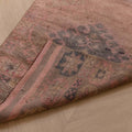 Handmade 2.7x9.5 ft wool and cotton Persian-style runner rug in pink and brown with bohemian geometric patterns.