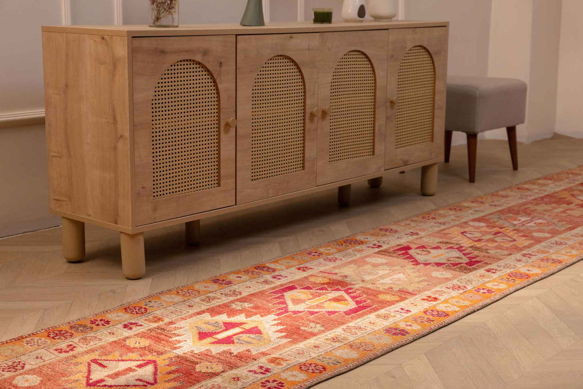 Handmade 2.6 x 13.5 ft Persian-style wool and cotton runner rug in red and orange with maximalist floral patterns.
