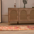 Handmade 2.6x13.5ft Persian-style runner rug in red and orange with maximalist floral patterns in wool and cotton.
