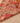 Handmade 2.6 x 13.5 ft wool and cotton Persian-style runner rug in red and orange with maximalist floral patterns.