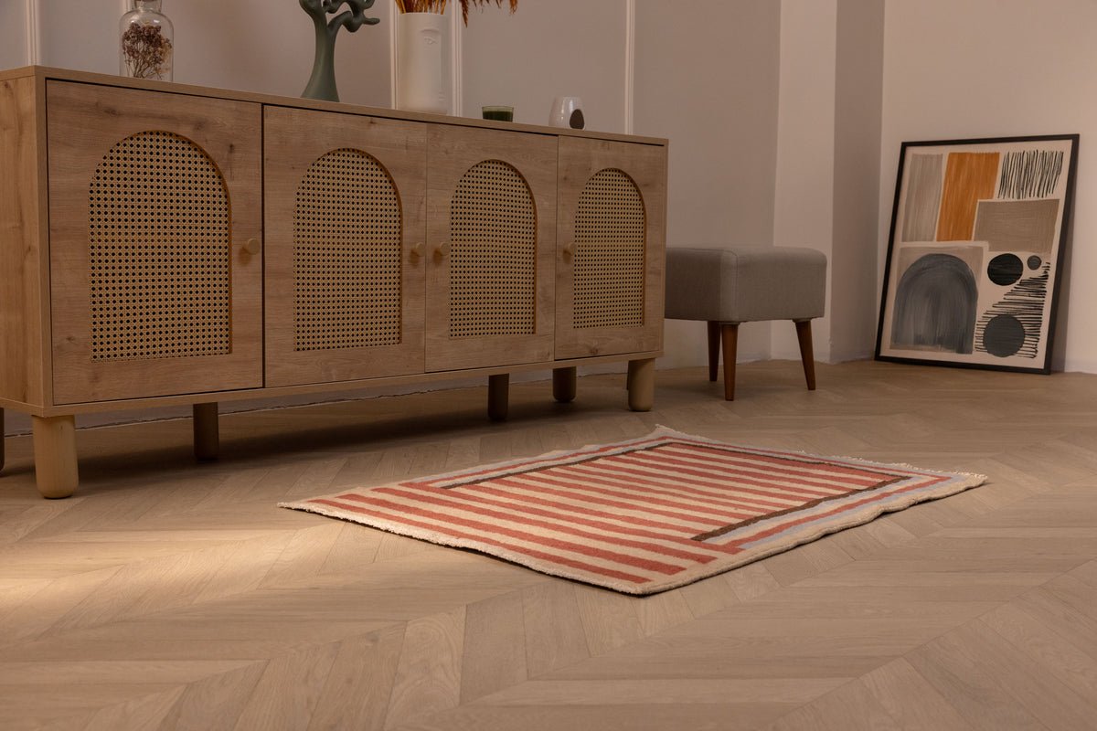 Handmade vintage Isparta wool and cotton rug in red and beige stripes, 2x3 ft, displayed on a wooden floor.