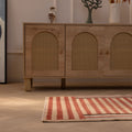 Handmade 2x3 ft vintage Isparta wool and cotton rug featuring red and beige stripes on a wooden floor.