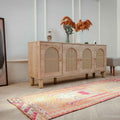 Handmade 2.7x9.9 ft wool and cotton Persian runner rug in orange and yellow with bohemian human-figured patterns.