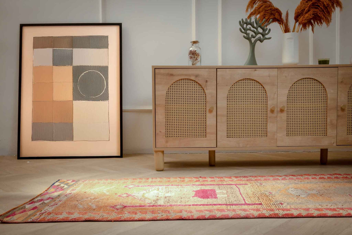 Handmade 2.7x9.9 ft wool and cotton Persian runner rug in bohemian orange and yellow with human-figured patterns.