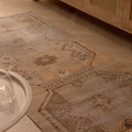 Vintage beige and brown geometric Turkish runner rug, hand-woven in wool and cotton with a distressed farmhouse style.