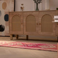 Handmade 2.5x12.6 ft pink and beige Persian-style wool-cotton runner rug with floral bohemian patterns.