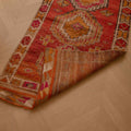 Handmade 2.5x10.5 ft Turkish runner rug in red and brown wool-cotton blend with geometric bohemian patterns.