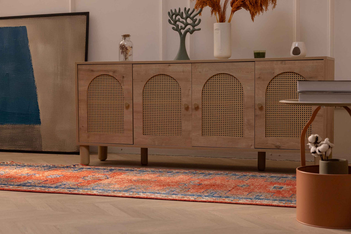 Vintage 3.4x13 ft Persian-style runner rug in orange and navy with a floral pattern, crafted from wool and cotton.