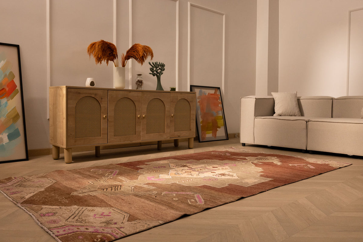 Hand-woven 5x9 ft vintage Kars Turkish rug in brown with geometric patterns, crafted from wool and cotton in a farmhouse style.