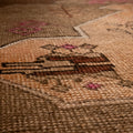 Hand-woven vintage Kars Turkish area rug in brown with geometric patterns, crafted from wool and cotton in a low pile.