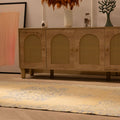 Vintage 4x8 ft handmade Turkish rug in yellow and blue with traditional floral patterns on a wool and cotton blend.