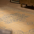 Hand-woven vintage Manisa Turkish rug in yellow and blue with traditional floral patterns, 4x8 ft wool and cotton blend.