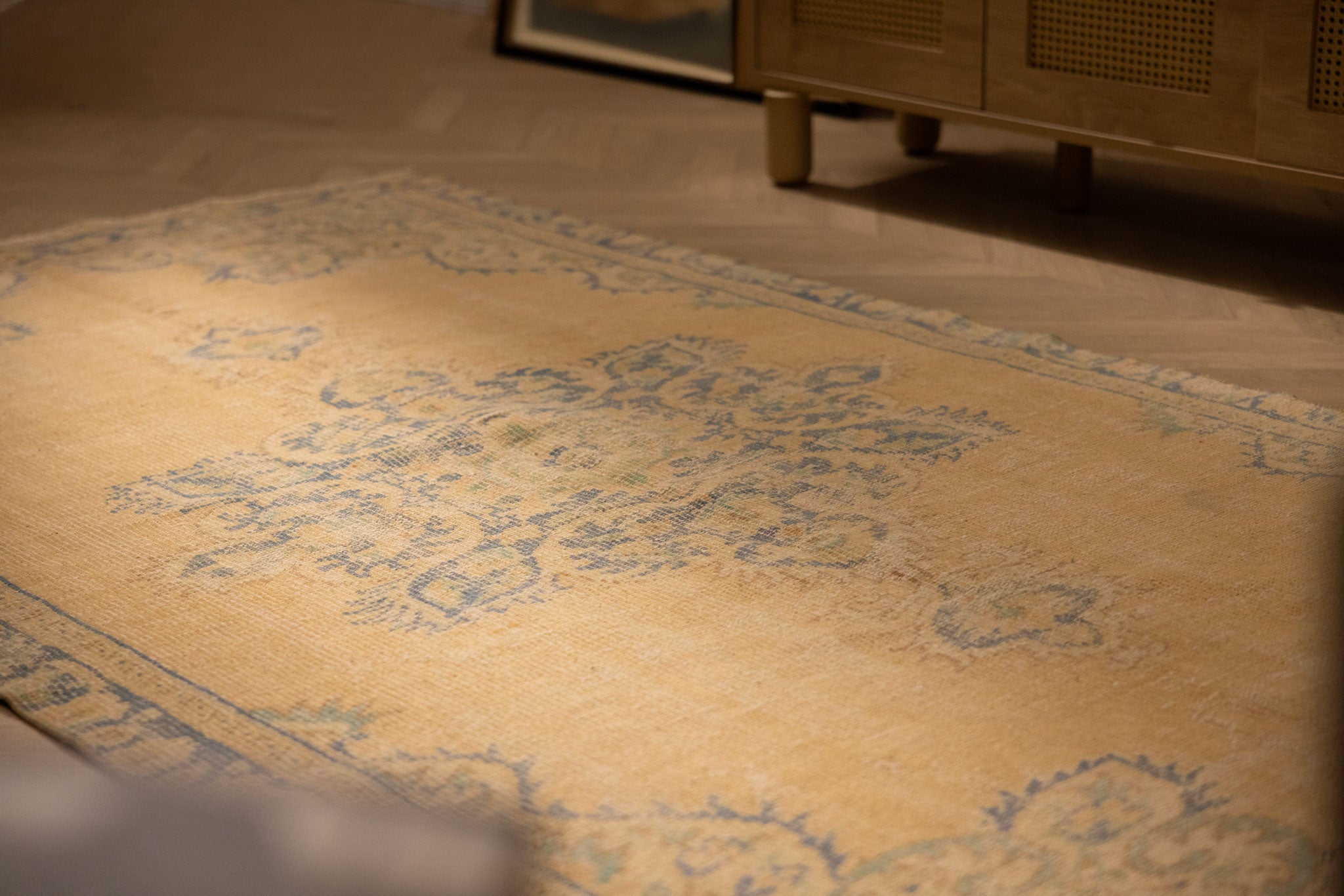 Hand-woven vintage Manisa Turkish rug in yellow and blue with traditional floral patterns, 4x8 ft wool and cotton blend.