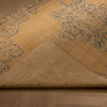 Hand-woven vintage Manisa Turkish rug in yellow and blue with floral patterns, 4x8 ft wool and cotton blend.