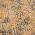 Hand-woven vintage Turkish rug with a low-pile wool and cotton blend in yellow and blue floral patterns.