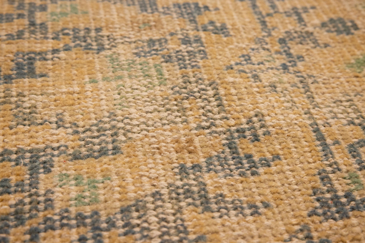 Hand-woven vintage Turkish rug with a low-pile wool and cotton blend in yellow and blue floral patterns.