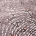 Hand-woven vintage Isparta rug in gray overdyed wool and cotton with rustic floral patterns and low pile texture.