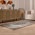 Vintage 3x6 ft Isparta wool and cotton rug in brown and gray with intricate floral patterns in a modern living room.
