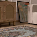 Hand-woven vintage Isparta wool and cotton rug in brown and gray with maximalist floral patterns.