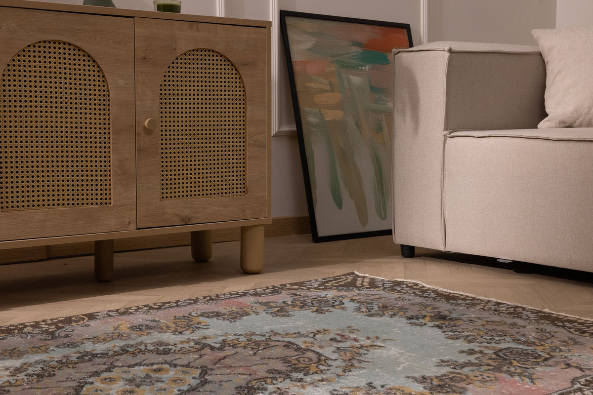 Hand-woven vintage Isparta wool and cotton rug in brown and gray with maximalist floral patterns.