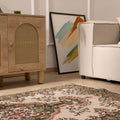 Hand-woven vintage Isparta rug in white and sage green with floral maximalist patterns, 3x6 ft wool and cotton blend.