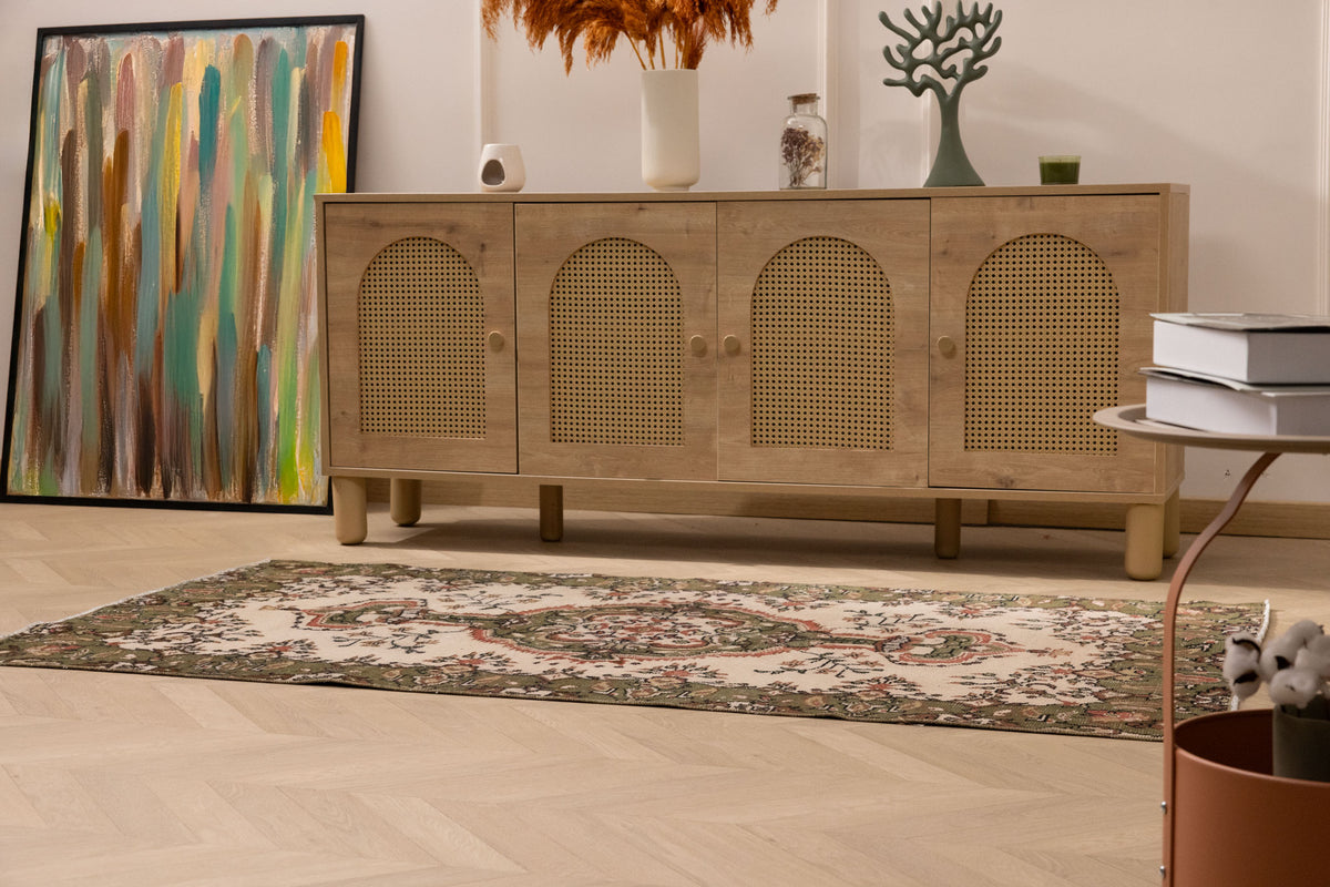 Hand-woven vintage Isparta rug in white and sage green with intricate floral patterns, 3.5x6.6 ft wool and cotton blend.
